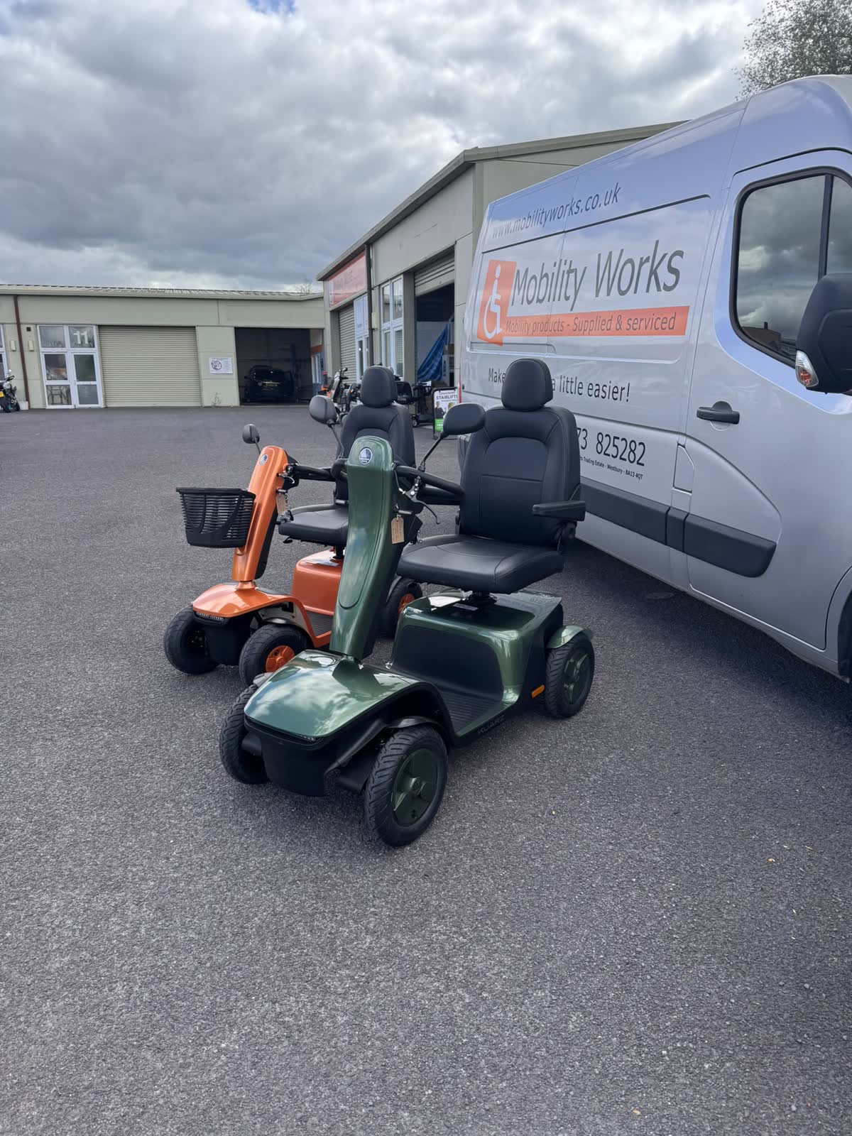 Vermeiren Kuarz and Sync mobility scooters on the forecourt at Mobility Works, Westbury